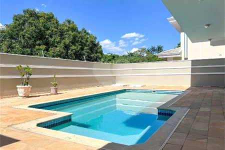 Casa à venda com 3 suítes no condomínio Portal do Lago, Valinhos - SP