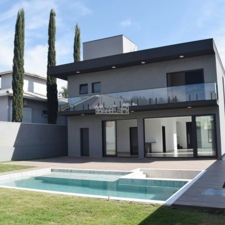 Casa à venda com 4 suítes no condomínio Figueira Garden, Atibaia - SP