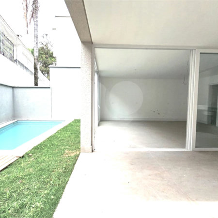 Casa à venda com 4 suítes no condomínio Vila Arese, São Paulo - SP