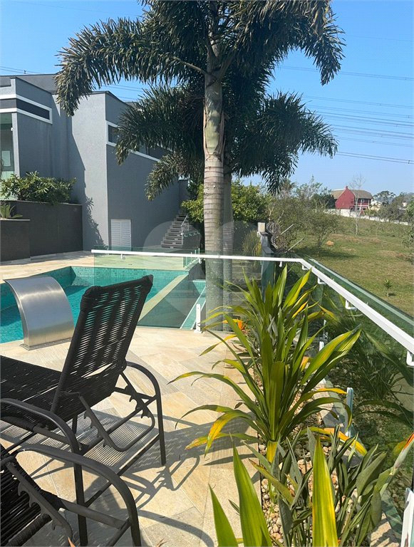 Casa à venda com 3 suítes no condomínio Aruã, Mogi das Cruzes - SP