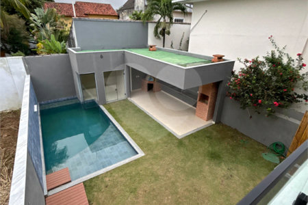 Casa à venda com 4 suítes no condomínio Riomar X, Rio de Janeiro - RJ
