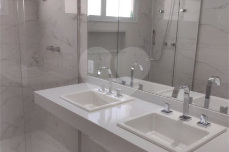 Casa à venda com 4 suítes no condomínio Estância Marambaia, Vinhedo - SP