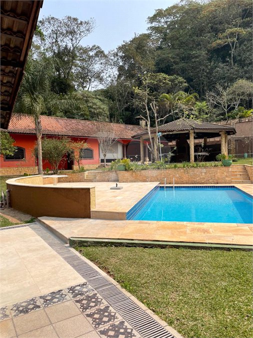 Casa à venda ou para alugar com 4 suítes no condomínio Alpes da Cantareira, Mairiporã - SP
