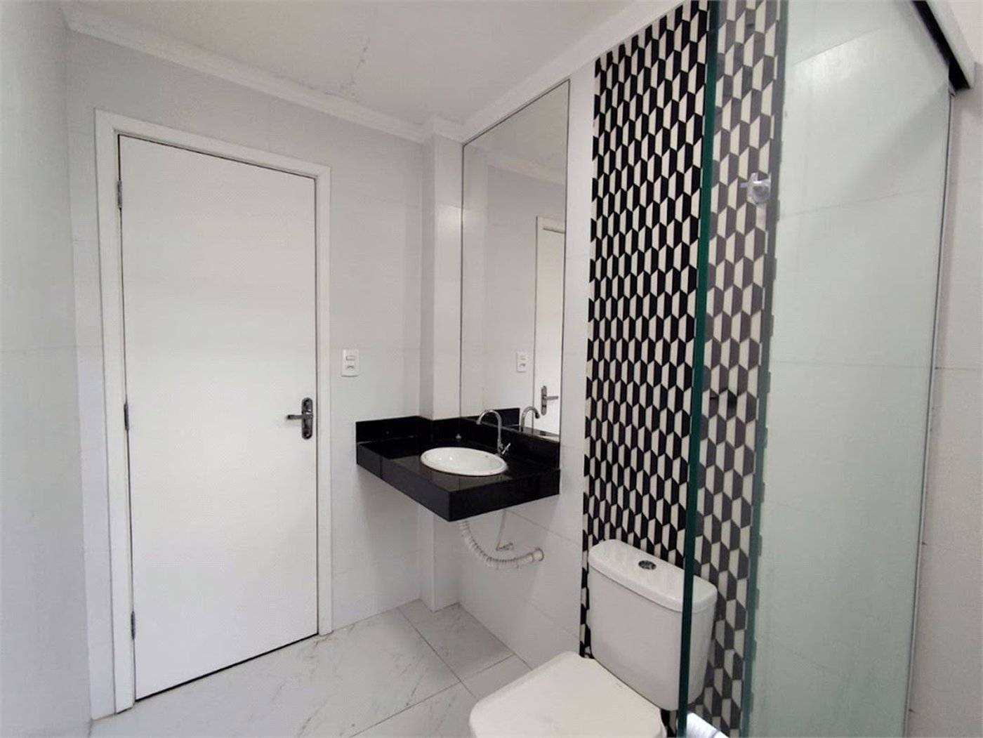 Apartamento com 2 dormitórios à venda, 65 m² por R$ 444.000,00 - Gonzaga - Santos/SP