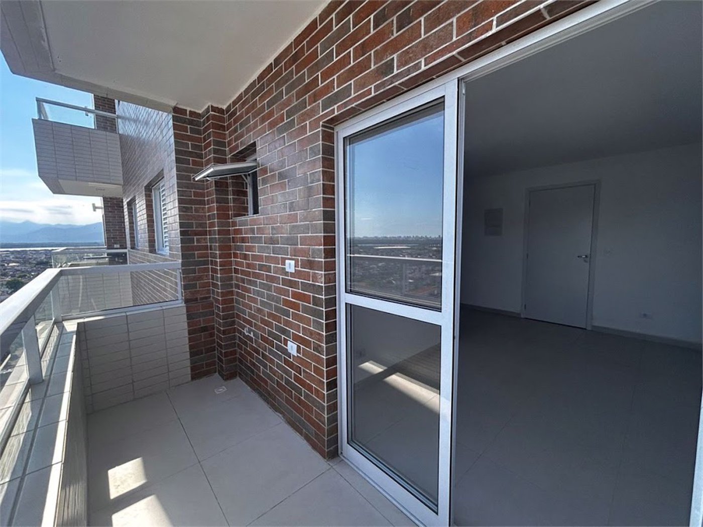 Apartamento com 2 dormitórios à venda, 58 m² por R$ 478.000,00 - Centro - São Vicente/SP