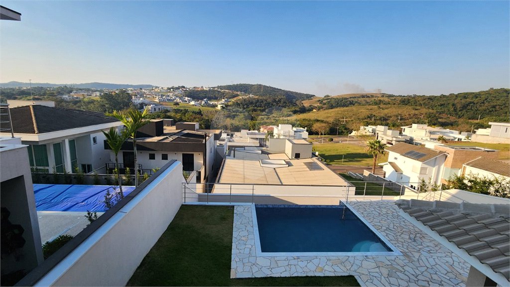 Casa à venda com 4 suítes no condomínio Santa Isabel I, Louveira - SP