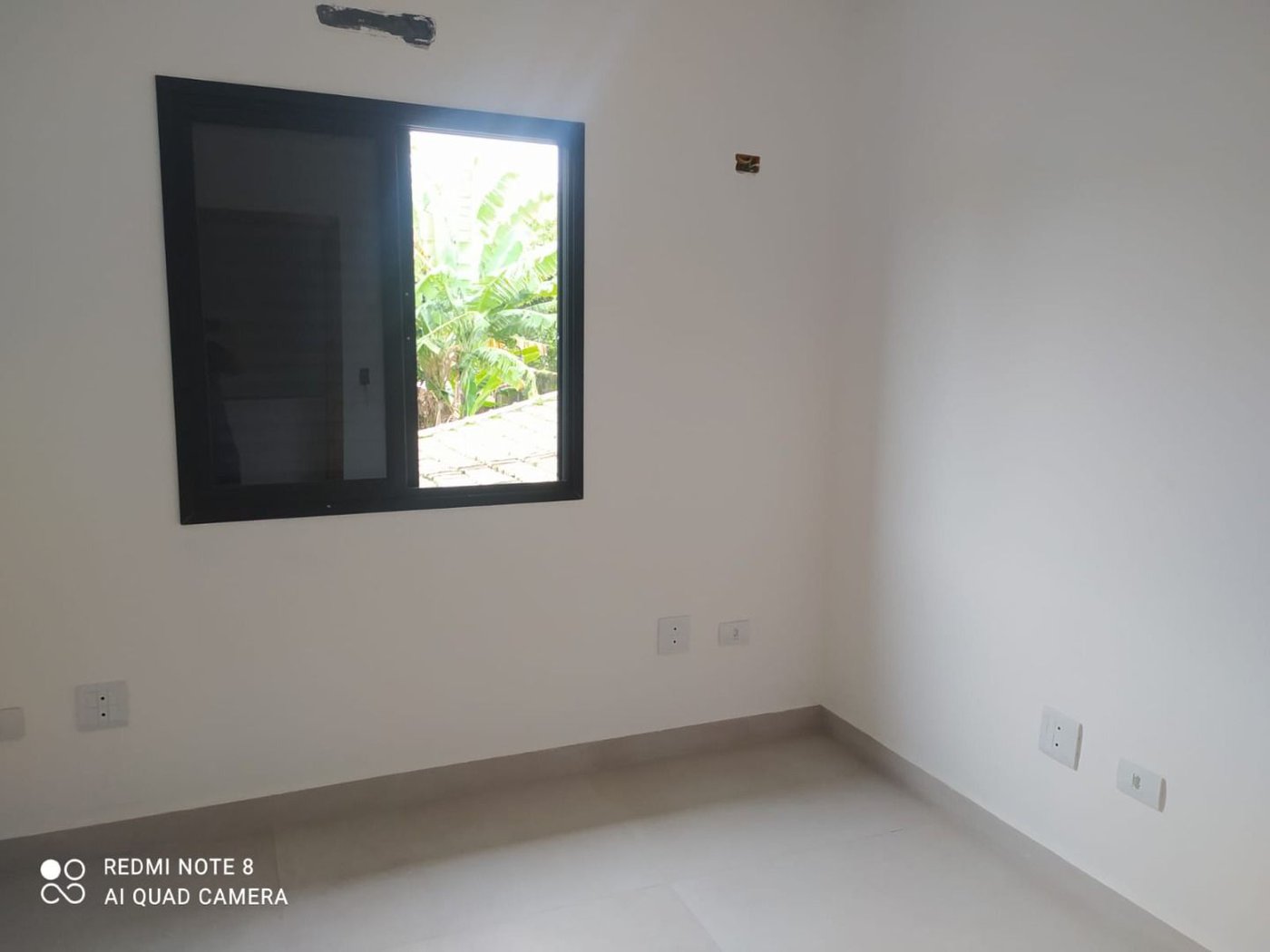 Sobrado com 3 dormitórios à venda, 107 m² por R$ 825.000,00 - Estuário - Santos/SP