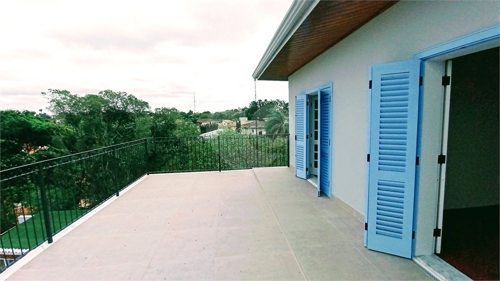 Casa à venda com 3 suítes no condomínio Estância Marambaia, Vinhedo - SP