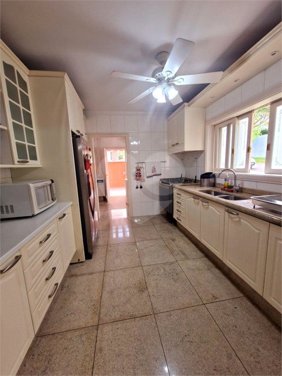 Casa à venda com 4 suítes no condomínio Estância Marambaia, Vinhedo - SP