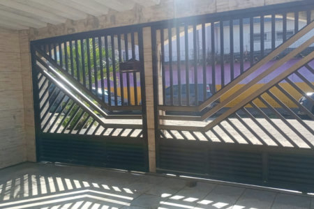 Casa com 3 dormitórios à venda, 140 m² por R$ 425.000,00 - Parque Bitaru - São Vicente/SP