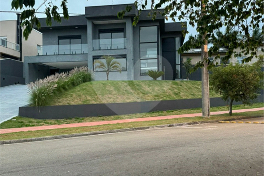 Casa à venda com 5 suítes no condomínio Residencial Santa Maria, Jandira - SP