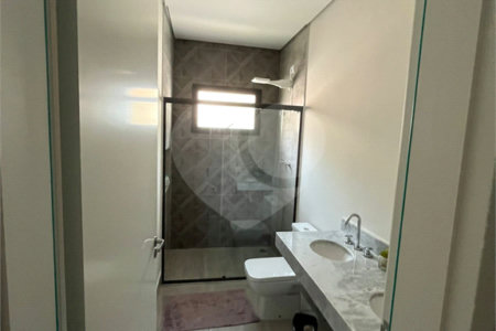 Casa à venda com 4 suítes no condomínio Figueira Garden, Atibaia - SP