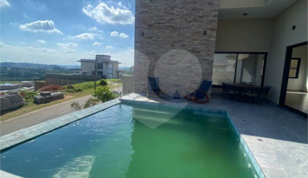 Casa à venda com 4 suítes no condomínio Campo de Toscana, Vinhedo - SP