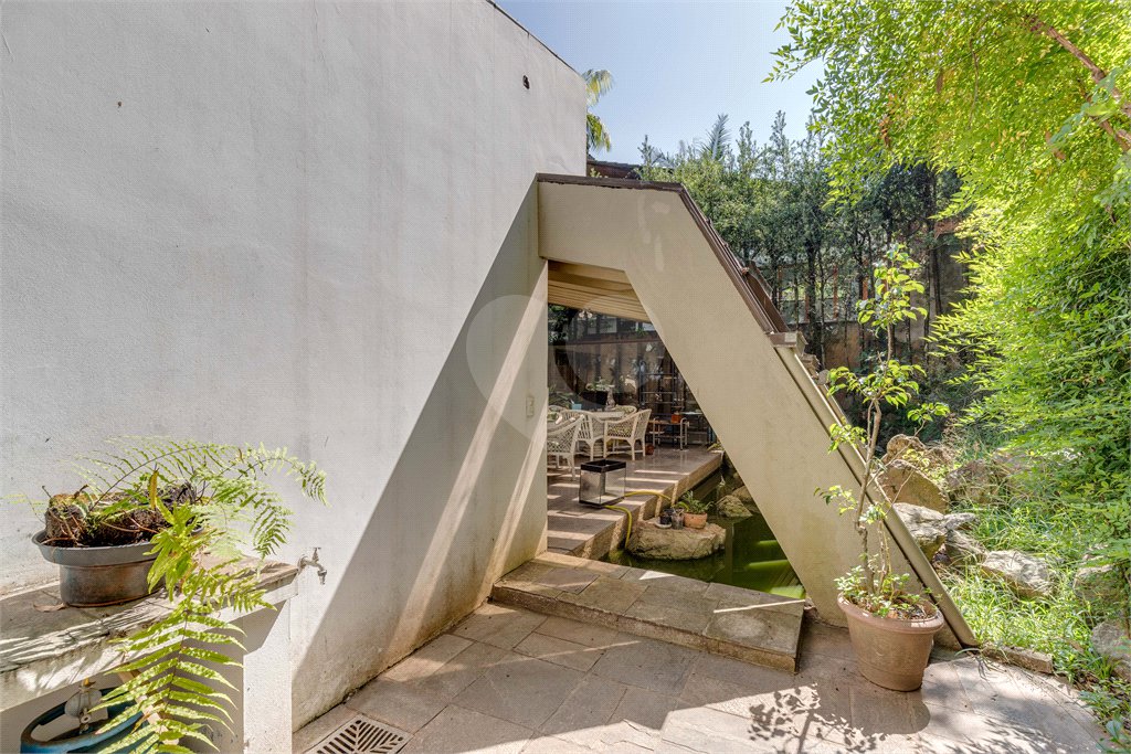 Casa à venda com 4 suítes no condomínio Granja do Morumbi, São Paulo - SP