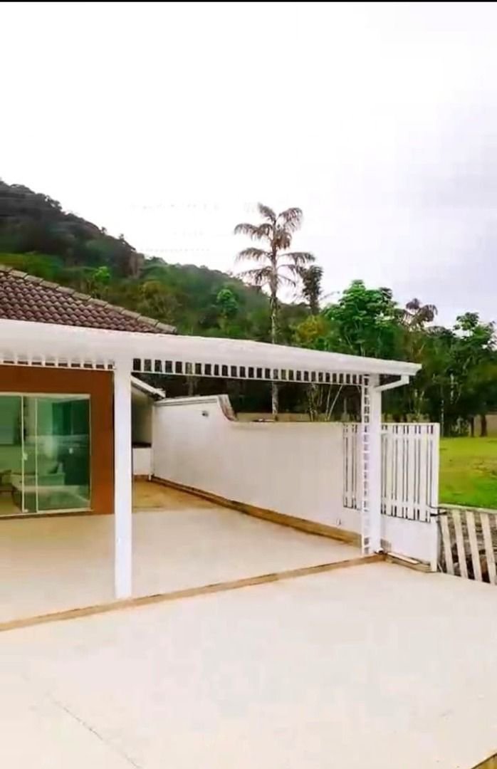 Casa com 5 dormitórios à venda, 900 m² por R$ 15.200.000,00 - Cidade Jardim Tom - Guarujá/SP