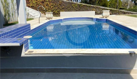 Casa à venda com 4 suítes no condomínio Estância Marambaia, Vinhedo - SP