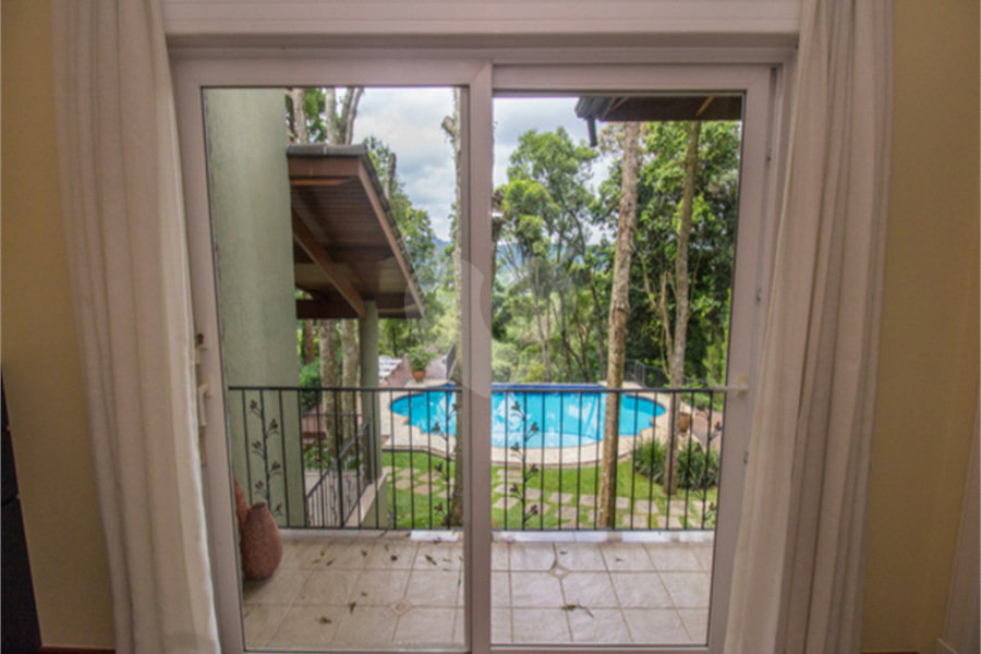 Casa à venda com 4 suítes no condomínio Alpes da Cantareira, Mairiporã - SP