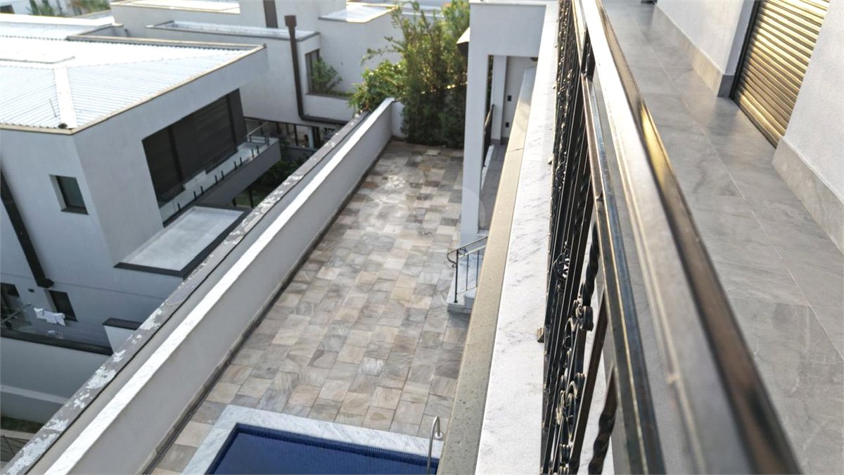 Casa à venda com 4 suítes no condomínio Alphaville Dom Pedro 3, Campinas - SP