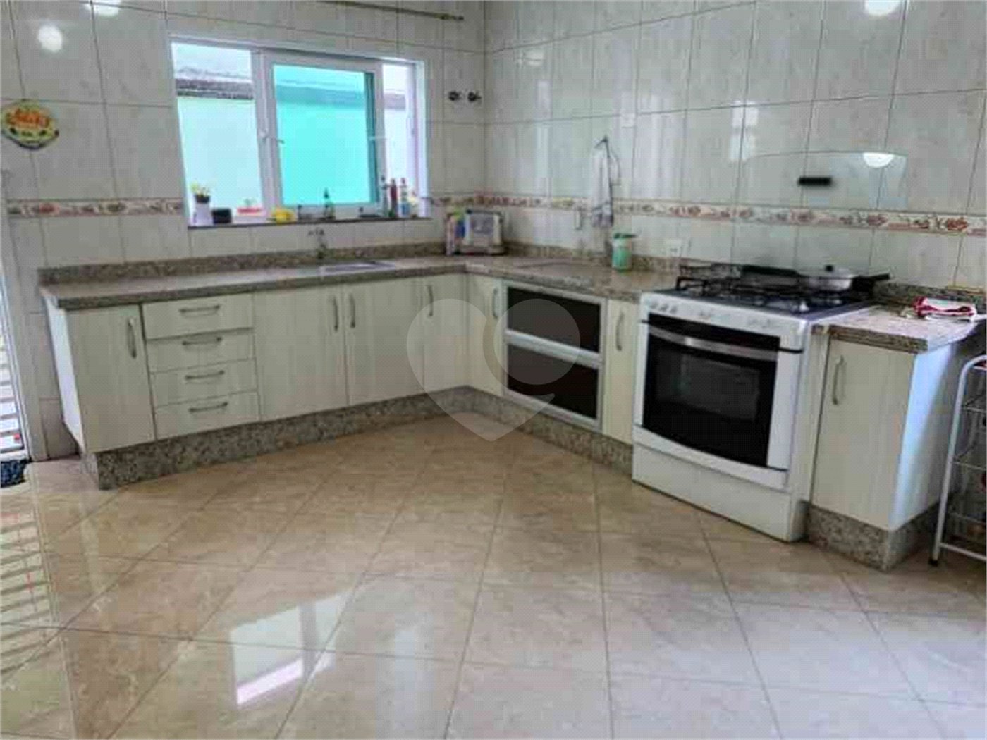 Casa à venda com 3 suítes no condomínio Quinta de Santo Antônio, São Paulo - SP