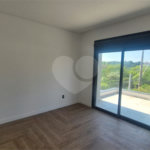 Casa à venda com 3 suítes no condomínio Recanto dos Paturis, Vinhedo - SP