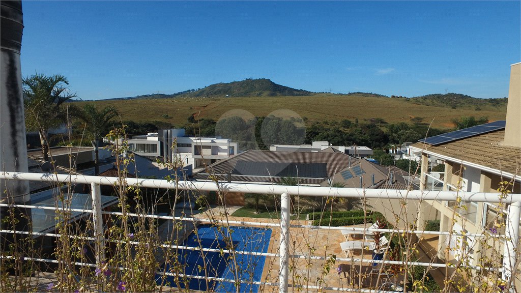 Casa à venda com 4 suítes no condomínio Figueira Gardn, Atibaia - SP