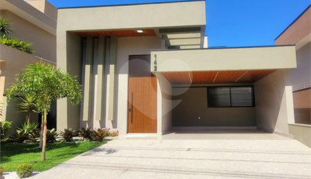 Casa à venda com 4 suítes no condomínio Sta Morriz, Campinas - SP