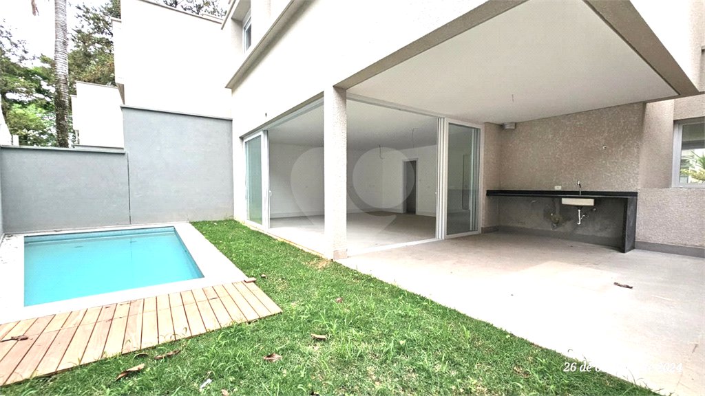 Casa à venda com 4 suítes no condomínio Vila Arese, São Paulo - SP