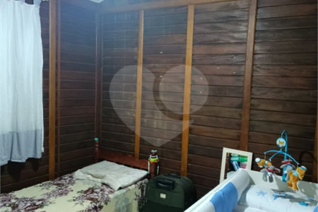 Casa à venda com 4 quartos, sendo 1 suíte,  no condomínio Morada da Praia, Bertioga - SP