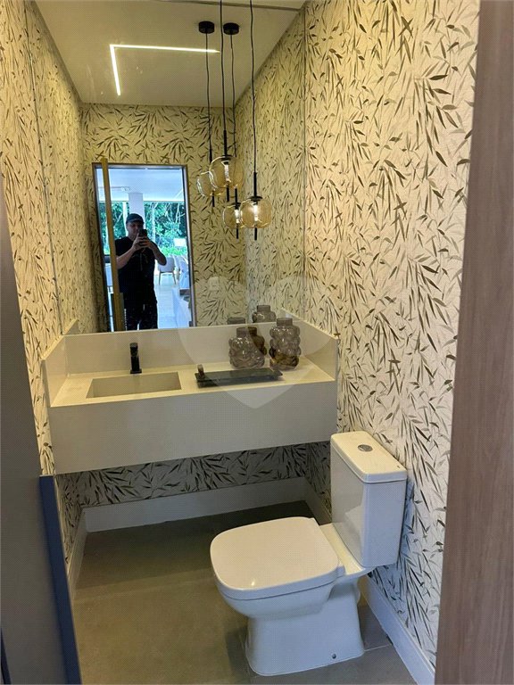 Casa à venda com 6 suítes no condomínio Golf CL, Bertioga - SP
