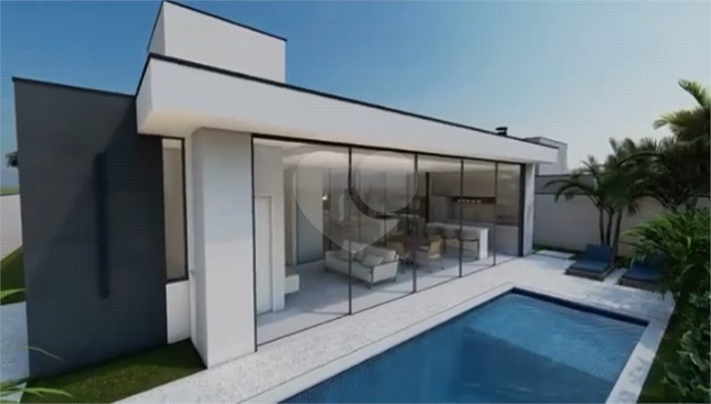 Terreno com casa em construção no Condomínio Alphaville I , em Ribeirão Preto/SP.