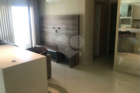 APARTAMENTO MOBILIADO EM FRENTE AO SHOPPING 02 DORMITÒRIOS