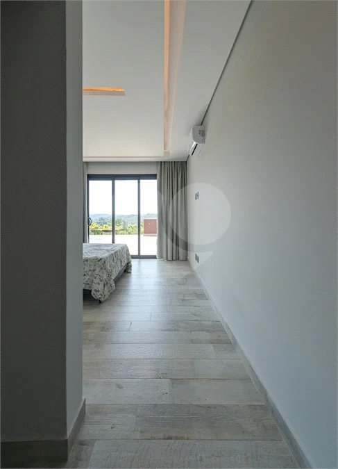Casa à venda com 4 suítes no condomínio Vale da Santa Fé, Vinhedo - SP