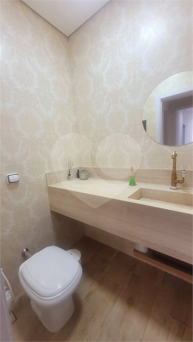 Casa à venda com 4 suítes no condomínio Sta Morriz, Campinas - SP