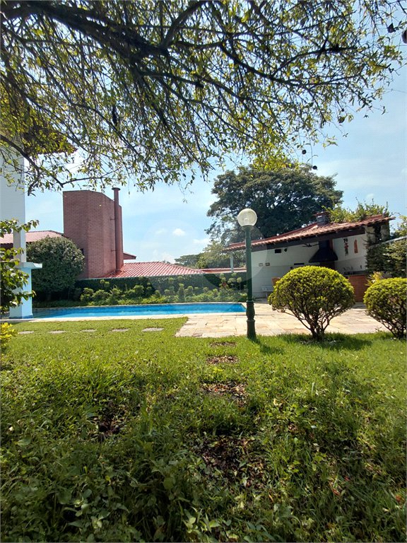 Casa à venda com 4 suítes no condomínio Ville Bourghese, São Paulo - SP