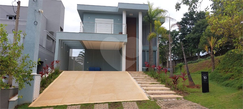 Casa à venda com 4 suítes no condomínio Figueira Garden, Atibaia - SP