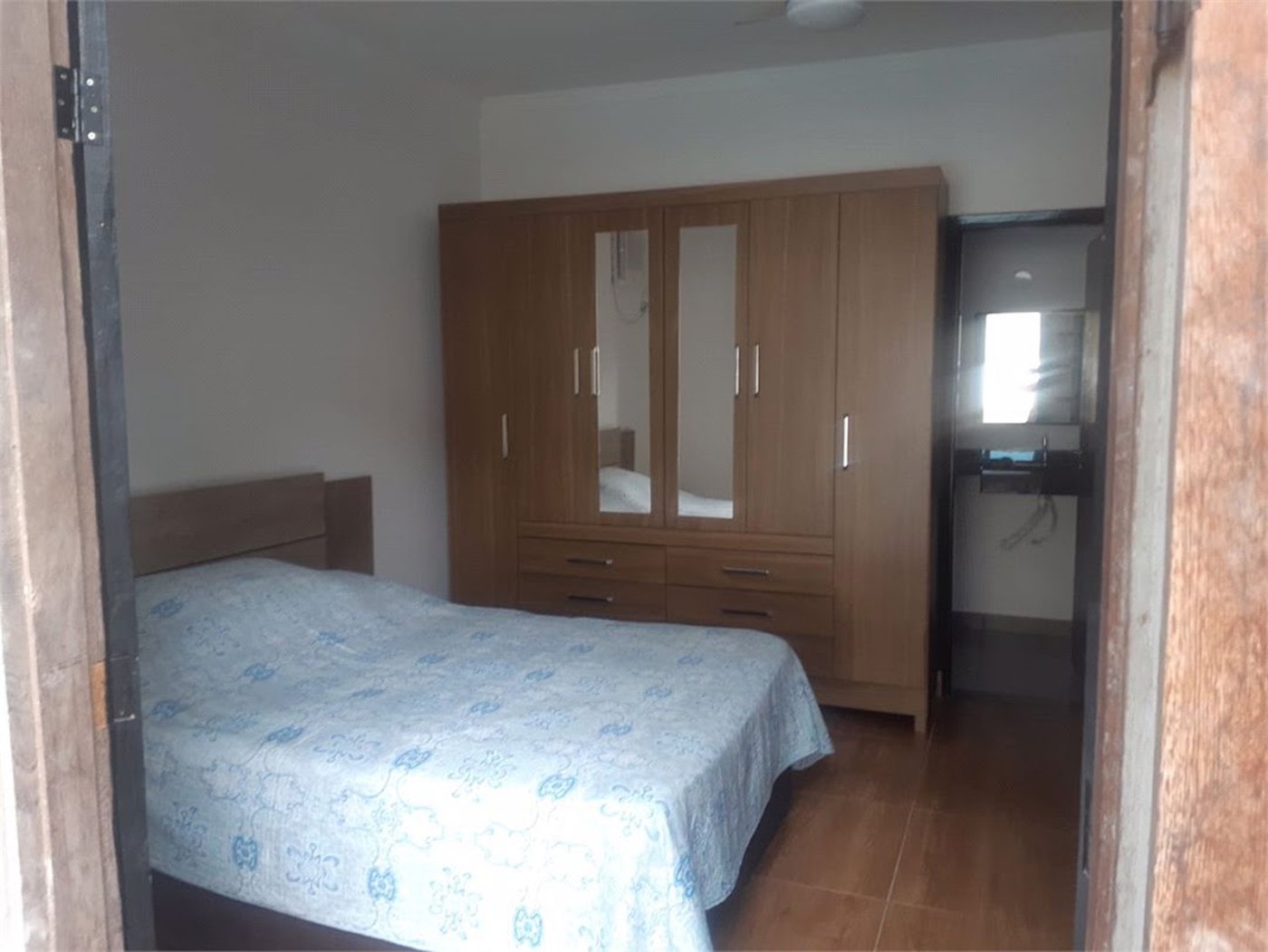 Casa com 4 dormitórios à venda, 180 m² por R$ 650.000,00 - Jardim Virginia - Guarujá/SP