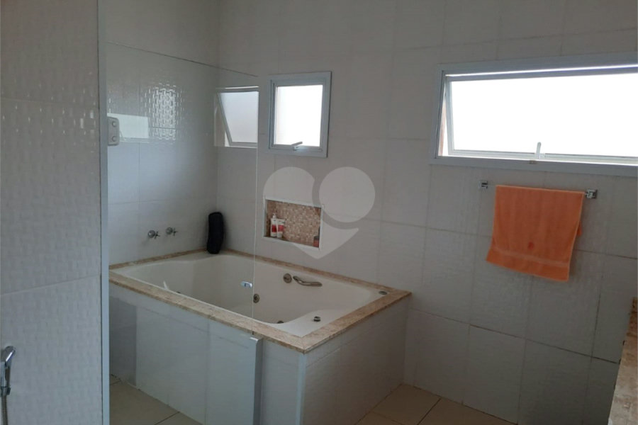 Casa à venda com 4 quartos, sendo 2 suítes, no condomínio Parque das Garças, Atibaia - SP