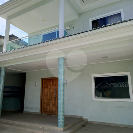 Casa à venda com 4 quartos, sendo 1 suíte, no condomínio Atlantico Sul, Rio de Janeiro - RJ