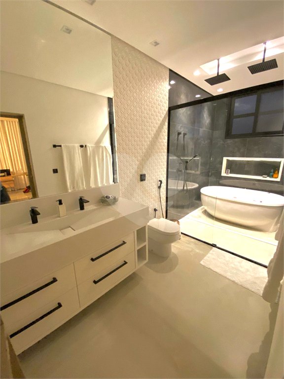 Casa à venda com 4 suítes no condomínio Alphaville Nova Esplanada 1, Votorantim - SP