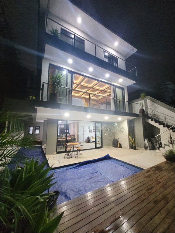 Casa à venda com 4 suítes no condomínio Jardim Itatinga, São Paulo - SP