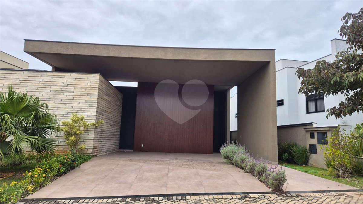 Casa à venda com 4 suítes no condomínio Alphaville Nova Esplanada 1, Votorantim - SP