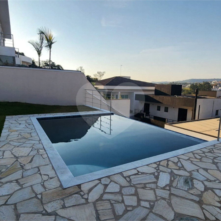 Casa à venda com 4 suítes no condomínio Santa Isabel I, Louveira - SP