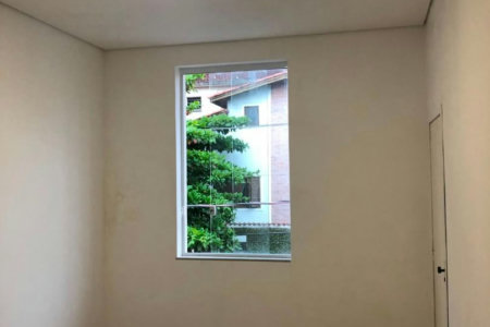 Casa com 3 dormitórios à venda, 116 m² por R$ 690.000,00 - Gonzaga - Santos/SP