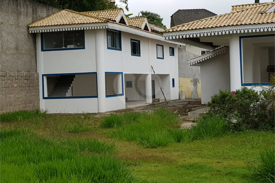 Casa à venda com 4 suítes no condomínio Suíça da Cantareira, Mairiporã - SP