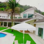 Casa com 5 dormitórios à venda, 900 m² por R$ 15.200.000,00 - Cidade Jardim Tom - Guarujá/SP
