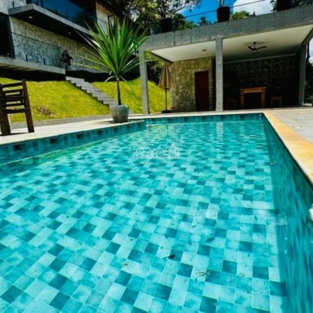 Casa à venda com 4 suítes no condomínio Portal Ouro Verde, Atibaia - SP