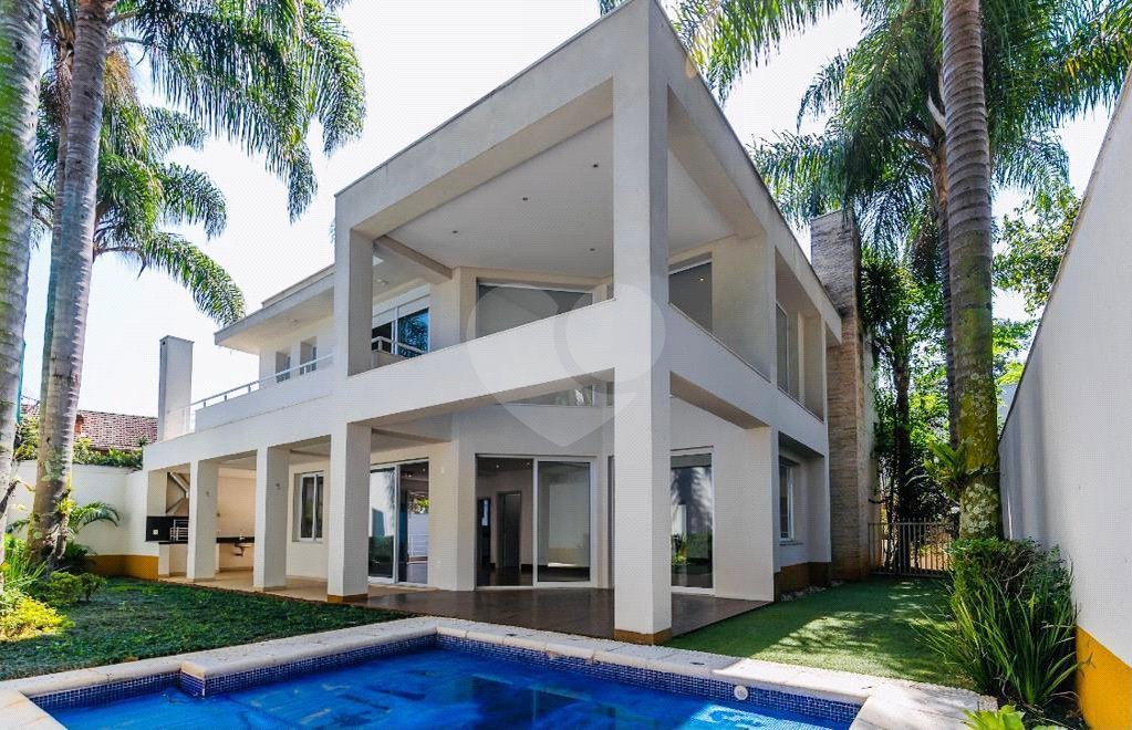 Casa à venda com 4 suítes no condomínio Vila Alba, São Paulo - SP