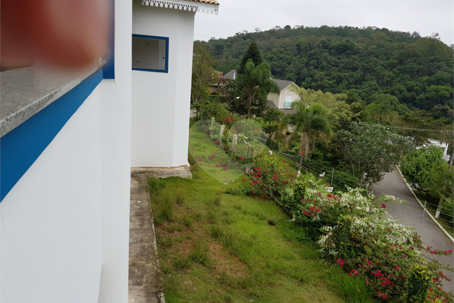 Casa à venda com 4 suítes no condomínio Suíça da Cantareira, Mairiporã - SP