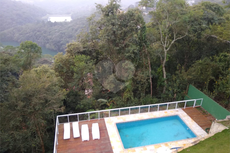 Casa à venda com 4 suítes no condomínio Alpes da Cantareira, Mairiporã - SP