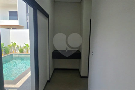Casa à venda com 5 suítes no condomínio Parque Faber IV, São Carlos - SP